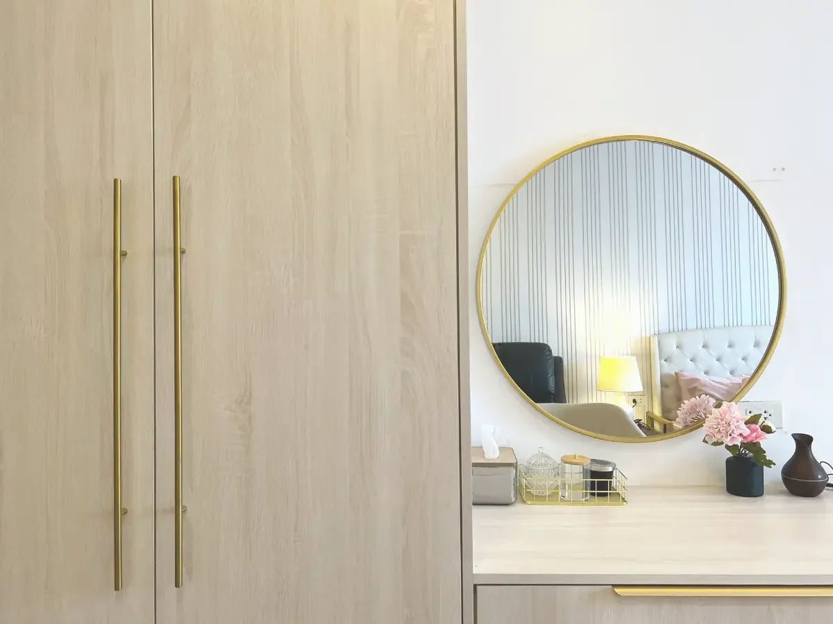 wooden mirror cabinet and desk in bedroom